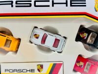 PORSCHE: A Matchbox Porsche Gift Set (MC-23) featuring a transporter and four 1:64 scale Porsche models, complete with original packaging [Location: Sydney] - 3