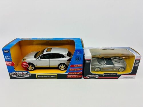 349 · PORSCHE: Two Porsche models by MSZ including a 1:32 scale model of the Cayenne S and a 1:39 scale model of the 918 Spyder, both complete with original packaging [Location: Sydney]