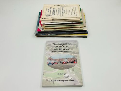 9 · ORAN PARK: A copy of the softcover book 'The quickest way round is on the Bitumen' by Neville Beyer together with a collection of race programmes dating from 1960s onwards [Location: Sydney]