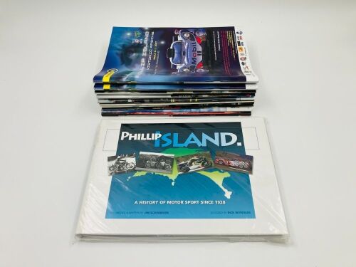PHILLIP ISLAND: A hardcover book 'Phillip Island: A History of Motor Sport Since 1928' by Jim Scaysbrook (shrink wrapped in plastic), together with a collection of historic race programmes [Location: Sydney]
