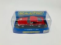 ALLAN MOFFAT: A pair of models of Moffat's No. 9 Mustang including a limited edition Scalextric slot car, numbered 2940/3500 together with a 1:64 scale model by DDA Collectibles and two unframed photographs (one signed by Allan Moffat) [Location: Sydney] - 3