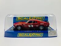 ALLAN MOFFAT: A pair of models of Moffat's No. 9 Mustang including a limited edition Scalextric slot car, numbered 2940/3500 together with a 1:64 scale model by DDA Collectibles and two unframed photographs (one signed by Allan Moffat) [Location: Sydney] - 4