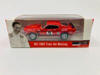 ALLAN MOFFAT: A pair of models of Moffat's No. 9 Mustang including a limited edition Scalextric slot car, numbered 2940/3500 together with a 1:64 scale model by DDA Collectibles and two unframed photographs (one signed by Allan Moffat) [Location: Sydney] - 10