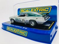 ALLAN MOFFAT: A 1:32 Scalextric slot car of Allan Moffat's No. 33 Brut sponsored Ford Mustang, in original packaging together with a copy of his hardcover autobiography 'Allan Moffat: Climbing the Mountain' [Location: Sydney] - 3