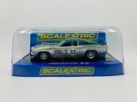 ALLAN MOFFAT: A 1:32 Scalextric slot car of Allan Moffat's No. 33 Brut sponsored Ford Mustang, in original packaging together with a copy of his hardcover autobiography 'Allan Moffat: Climbing the Mountain' [Location: Sydney] - 5