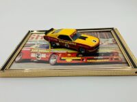 FORD MUSTANG SPORTS SEDAN: A 1:43 scale model by Armco of Jim Richards' Sidchrome Mustang Sports Sedan, together with a framed colour photo of the same car [Location: Sydney]