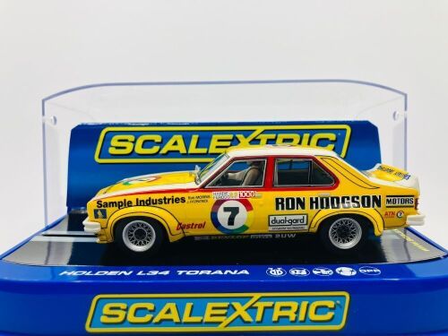 HOLDEN LH TORANA L34: A 1:32 Scalextric slot car in Ron Hodgson Channel 7 livery of Bob Morris/John Fitzpatrick, in original packaging [Location: Sydney]