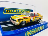 HOLDEN LH TORANA L34: A 1:32 Scalextric slot car in Ron Hodgson Channel 7 livery of Bob Morris/John Fitzpatrick, in original packaging [Location: Sydney] - 2