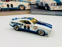 FORD XC FALCON: A 1:43 scale model by Dinkum Classics of the 1978 Bathurst #2 car, together with two colour images of the same car mounted on board, 33cm wide by 16cm high [Location: Sydney] - 2