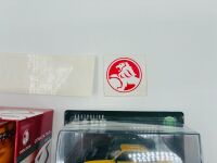 HOLDEN TORANA: A 1:43 scale IXO model of the 1977 LX Torana A9X, together with a ceramic Torana mug and two Holden stickers. [Location: Sydney] - 4