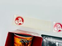 HOLDEN TORANA: A 1:43 scale IXO model of the 1977 LX Torana A9X, together with a ceramic Torana mug and two Holden stickers. [Location: Sydney] - 5