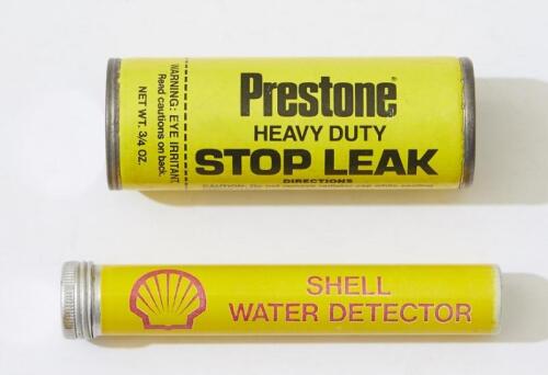 SHELL: A metal water detector tube.