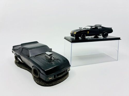 66 · MAD MAX: Two models of the XB Falcon 'Interceptor' including a resin paperweight and a 1:43 scale model by Greenlight [Location: Sydney]