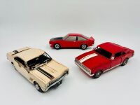 HOLDEN: Two handmade 1:18 scale metal models of the HK Monaro together with a 1:18 scale model of the Torana A9X Hatch [Location: Sydney]