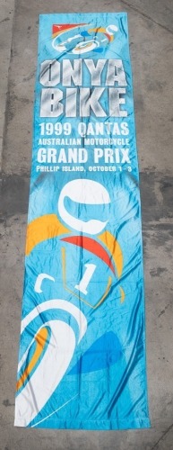 AUSSIE MOTOGP: A large banner flag promoting the 1999 Qantas Australian Motorcycle Grand Prix at Phillip Island, 3.35m high, 76cm wide