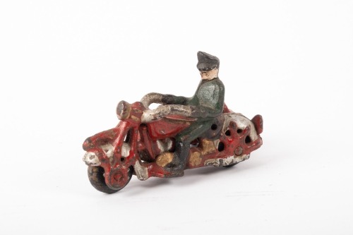 CAST IRON MODEL: A small modern cast iron motorcycle with rider & sidecar, 10cm long