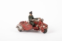 CAST IRON MODEL: A small modern cast iron motorcycle with rider & sidecar, 10cm long - 2