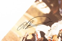 MICK DOOHAN: A signed poster promoting the 1999 Australian Grand Prix at Phillip Island, signed by Mick Doohan, 58cm high, 42cm wide - 2