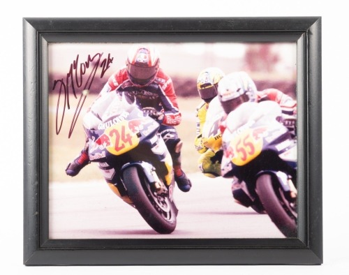 GARRY MCCOY: A signed photograph of Garry McCoy circa 2000 riding his Red Bull Yamaha WCM, bike number 24, image 19.5cm high, 24.5cm wide