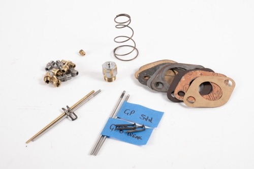 AMAL CARBURETOR PARTS: A group of Amal carburetor parts