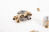 AMAL CARBURETOR PARTS: A group of Amal carburetor parts - 2