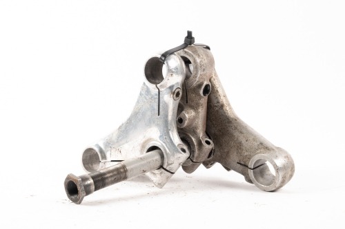 TRIPLE CLAMPS: A group of three triple clamps, one believed to be a Ceriani 35mm type