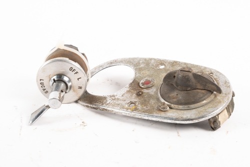 HEADLIGHT SWITCH: A Lucas headlight switch and also additional pre-war fuel tank instrument panel with switch