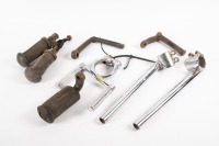 FOOTRESTS / HANDLEBARS: A tub of assorted footrests & clip on handlebars