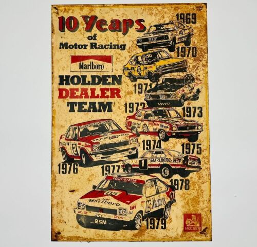 75 · HOLDEN DEALER TEAM: A tin promotional sign celebrating ten years of the Holden Dealer Team 1969-1979 [Location: Sydney]