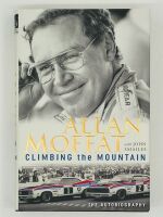 ALLAN MOFFAT: A 1:32 Scalextric slot car of Allan Moffat's No. 33 Brut sponsored Ford Mustang, in original packaging together with a copy of his hardcover autobiography 'Allan Moffat: Climbing the Mountain' [Location: Sydney] - 7