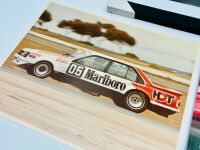 PETER BROCK: A framed print of Peter Brock racing in HDT Toranas, together with a unframed colour print of the LJ Torana L34 and an unopened 2024 calendar [Location: Sydney] - 3