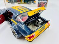 CHEVROLET CAMARO: A 1:18 scale model by Classic Carlectables of the Chevrolet Camaro in Kevin Bartlett's Channel 9 #9 livery, in original packaging together with a colour photo mounted on board showing the car at Bathurst in 1981 [Location: Sydney] - 9