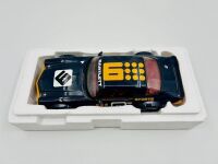 CHEVROLET CAMARO: A 1:18 scale model by Classic Carlectables of the Chevrolet Camaro in Kevin Bartlett's Channel 9 #9 livery, in original packaging together with a colour photo mounted on board showing the car at Bathurst in 1981 [Location: Sydney] - 10