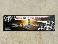 KING OF THE MOUNTAIN: A metal board depicting Peter Brock at Bathurst, 100cm wide by 30cm high [Location: Sydney]