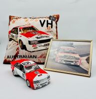 HOLDEN VK COMMODORE: A 1:18 scale model by Biante of the Peter Brock/Larry Perkins #05 car in original packaging, together with a cushion depicting a similar car [Location: Sydney]
