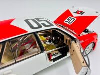 HOLDEN VK COMMODORE: A 1:18 scale model by Biante of the Peter Brock/Larry Perkins #05 car in original packaging, together with a cushion depicting a similar car [Location: Sydney] - 7