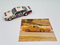 HOLDEN VL COMMODORE: A 1:18 scale ceramic money box depicting the HDT #10 car together with a colour photograph of the #37 Mobile Concrete Pumping car of Brian Callaghan/Barry Graham signed by both drivers [Location: Sydney]