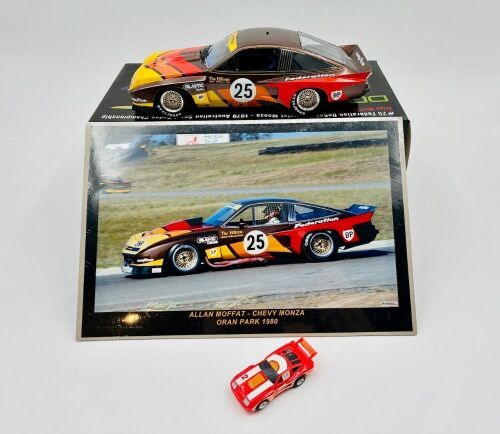 92 · CHEVROLET DEKON MONZA: A 1:18 scale model by Real Art Replicas of Allan Moffat's #25 Federation Dekon Monza Sports Sedan, together with two unframed colour photos of the same car and a slot car of another Dekon Monza [Location: Sydney]