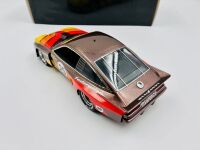 CHEVROLET DEKON MONZA: A 1:18 scale model by Real Art Replicas of Allan Moffat's #25 Federation Dekon Monza Sports Sedan, together with two unframed colour photos of the same car and a slot car of another Dekon Monza [Location: Sydney] - 3