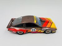 CHEVROLET DEKON MONZA: A 1:18 scale model by Real Art Replicas of Allan Moffat's #25 Federation Dekon Monza Sports Sedan, together with two unframed colour photos of the same car and a slot car of another Dekon Monza [Location: Sydney] - 5