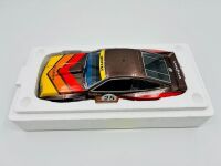 CHEVROLET DEKON MONZA: A 1:18 scale model by Real Art Replicas of Allan Moffat's #25 Federation Dekon Monza Sports Sedan, together with two unframed colour photos of the same car and a slot car of another Dekon Monza [Location: Sydney] - 7