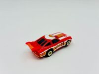 CHEVROLET DEKON MONZA: A 1:18 scale model by Real Art Replicas of Allan Moffat's #25 Federation Dekon Monza Sports Sedan, together with two unframed colour photos of the same car and a slot car of another Dekon Monza [Location: Sydney] - 11