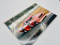 SPORTS SEDAN: A group of colour photographs of various Australian Sports Sedans, including one signed by Bob Jane together with an original race programme for the Daily Mirror Sports Sedan Classic at Oran Park on June 20, 1976 [Location: Sydney] - 11