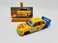 DICK JOHNSON RACING: A 1:24 scale model of John Bowe's #18 EB Falcon by Dinkum Classics together with a photo on board of Dick Johnson's #17 Falcon. [Location: Sydney]