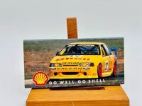 DICK JOHNSON RACING: A 1:24 scale model of John Bowe's #18 EB Falcon by Dinkum Classics together with a photo on board of Dick Johnson's #17 Falcon. [Location: Sydney] - 6