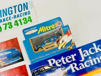FORD FALCON ATCC: A group of early 1990's ATCC Falcon items including a photo mounted on board signed by Glenn Seton, a 1:64 scale Matchbox model and a range of stickers from different teams . [Location: Sydney] - 2