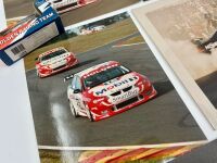 CRAIG LOWNDES: A group of HRT items including a colour photo mounted on card with signature, three loose photos and two Classic Carlectable models, one 1:43 and the other 1:64 scale. [Location: Sydney] - 3