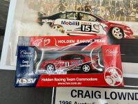 CRAIG LOWNDES: A group of HRT items including a colour photo mounted on card with signature, three loose photos and two Classic Carlectable models, one 1:43 and the other 1:64 scale. [Location: Sydney] - 10