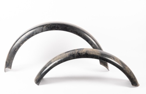 TRIUMPH: A pair of circa 1960s Triumph NOS mudguards