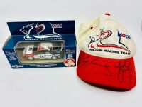 HOLDEN RACING TEAM: A HRT cap signed by Craig Lowndes and Mark Skaife together with a 1:43 scale model by Classic Carlectables of HRT VT Commodore [Location: Sydney]
